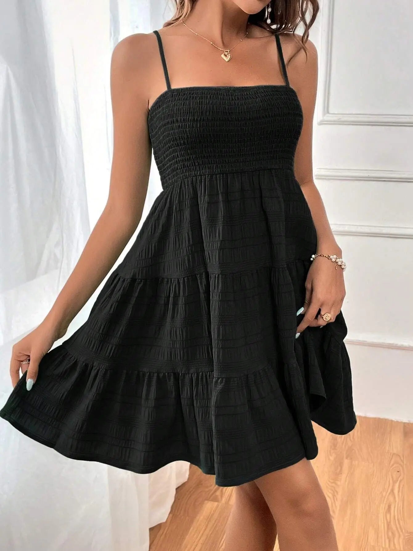 Ruba Tiered A-Line Mini Dress
فستان رُبى الميني المتدرّج
