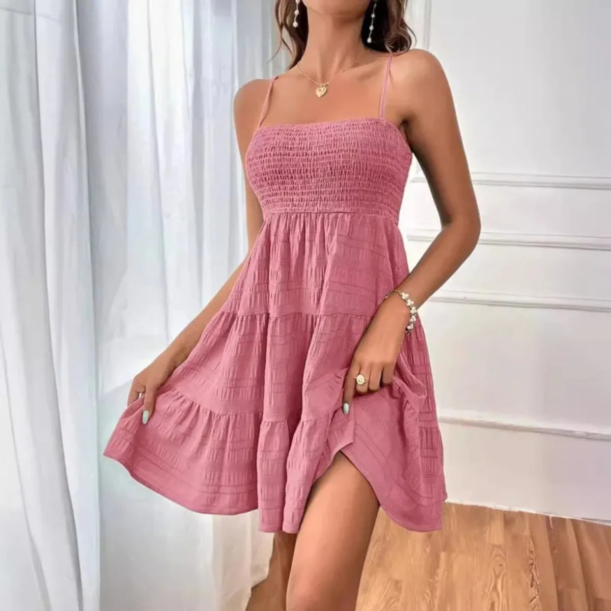 Ruba Tiered A-Line Mini Dress
فستان رُبى الميني المتدرّج