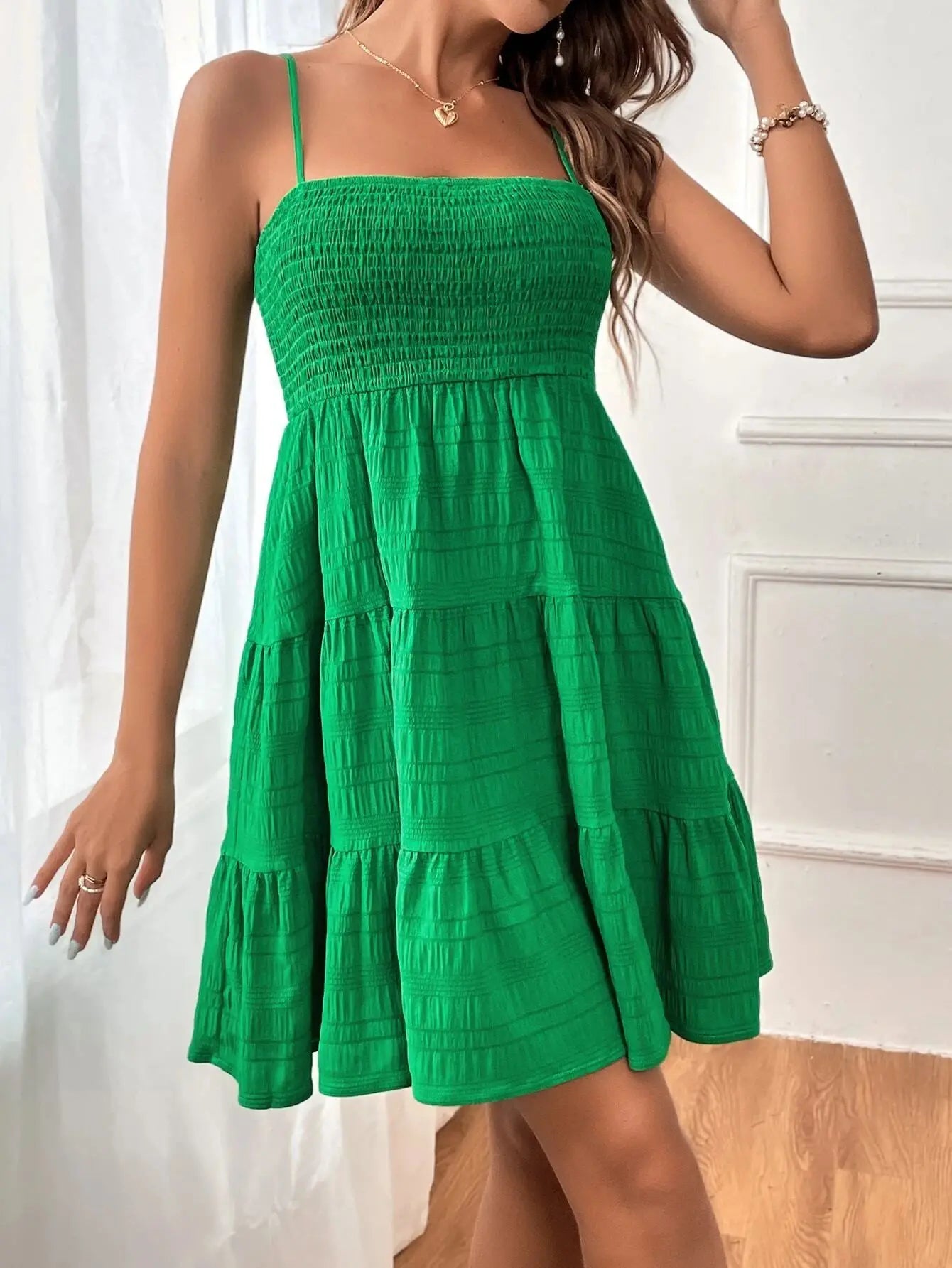 Ruba Tiered A-Line Mini Dress
فستان رُبى الميني المتدرّج