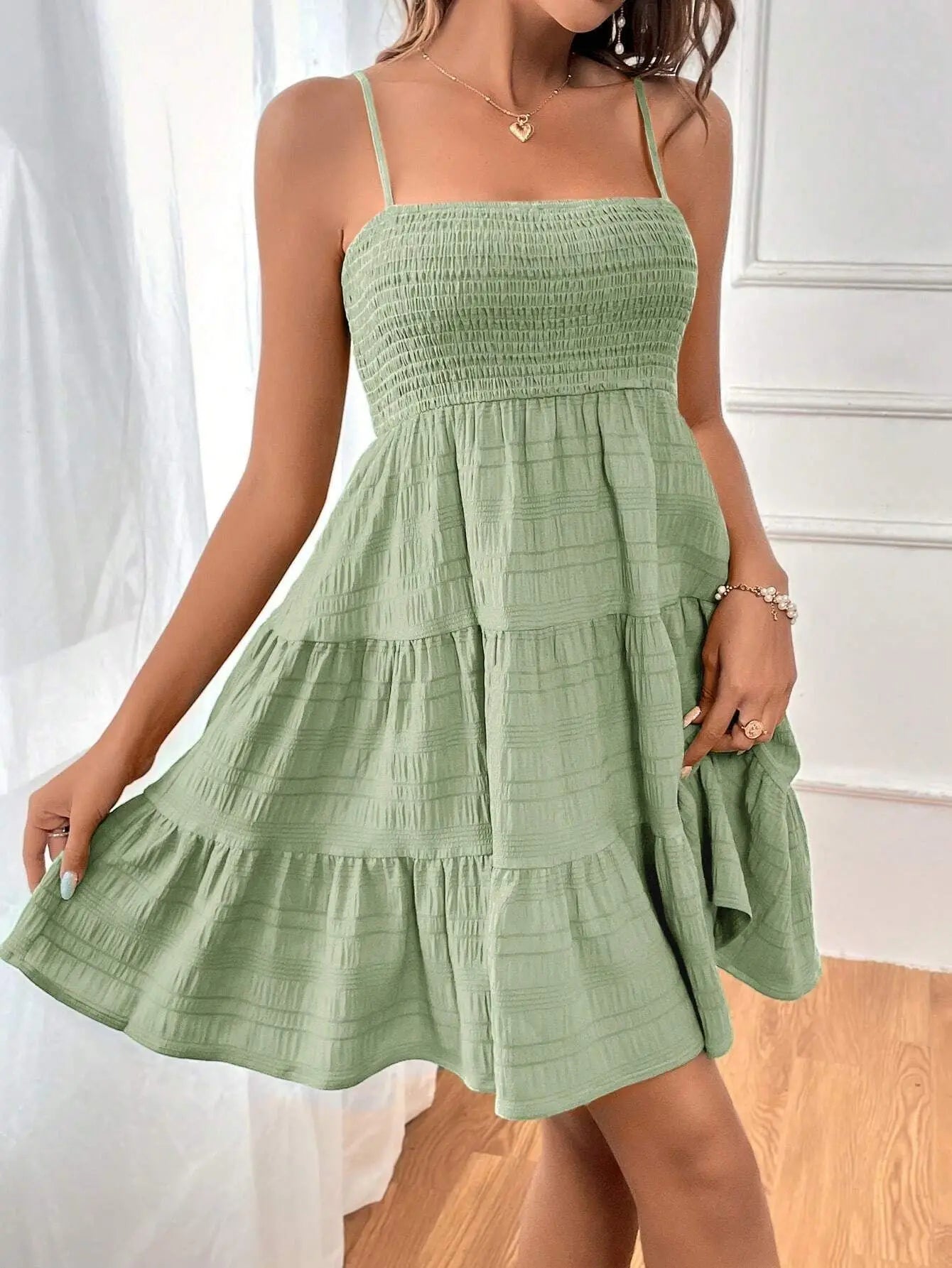 Ruba Tiered A-Line Mini Dress
فستان رُبى الميني المتدرّج