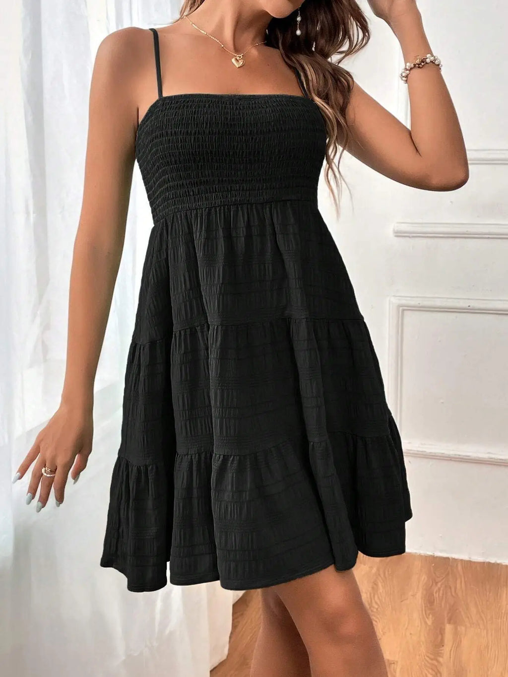 Ruba Tiered A-Line Mini Dress
فستان رُبى الميني المتدرّج