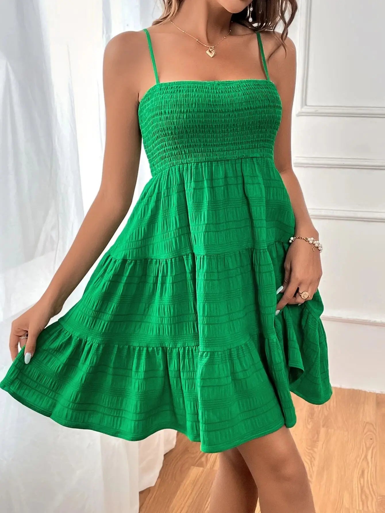 Ruba Tiered A-Line Mini Dress
فستان رُبى الميني المتدرّج