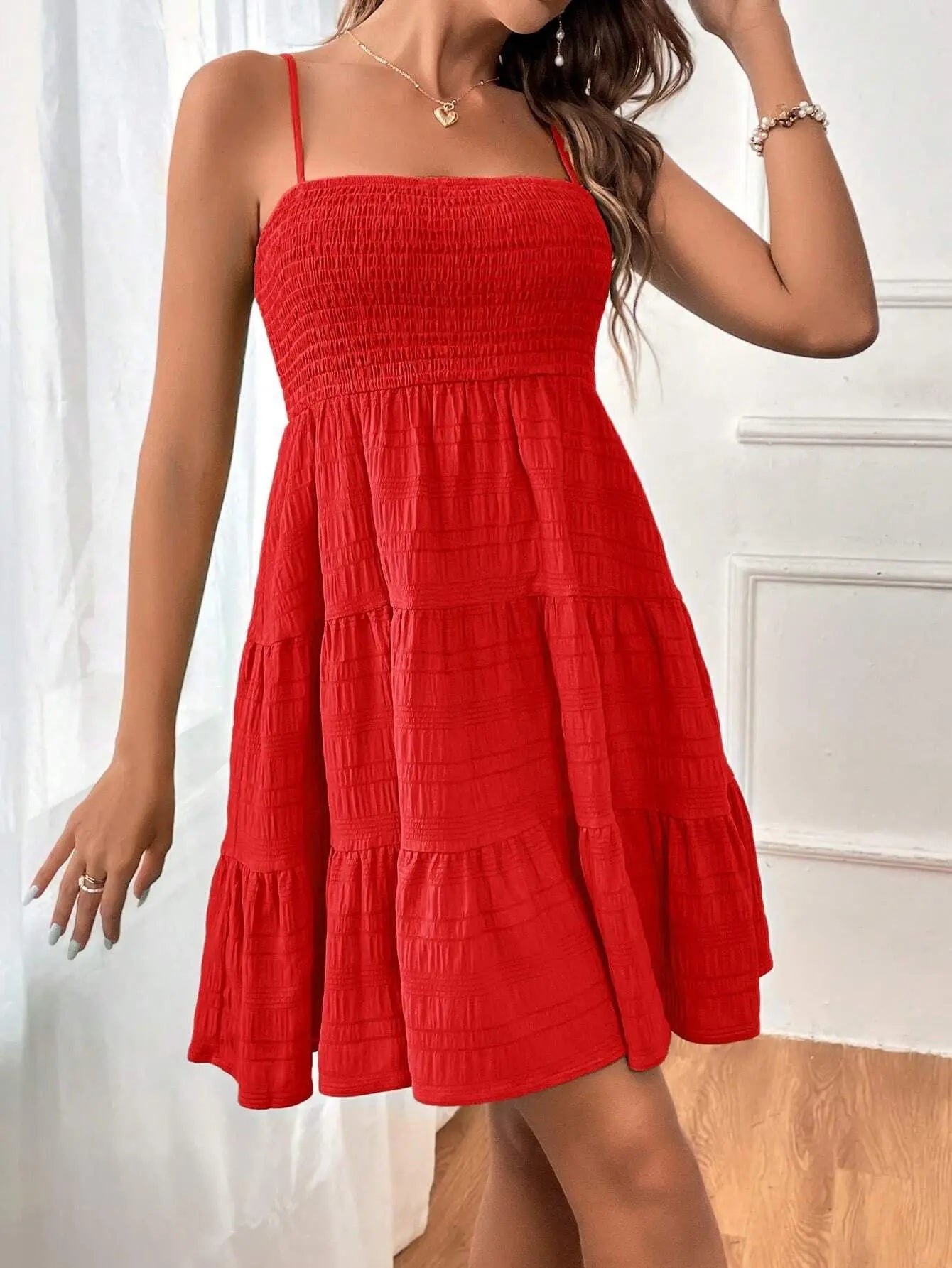 Ruba Tiered A-Line Mini Dress
فستان رُبى الميني المتدرّج
