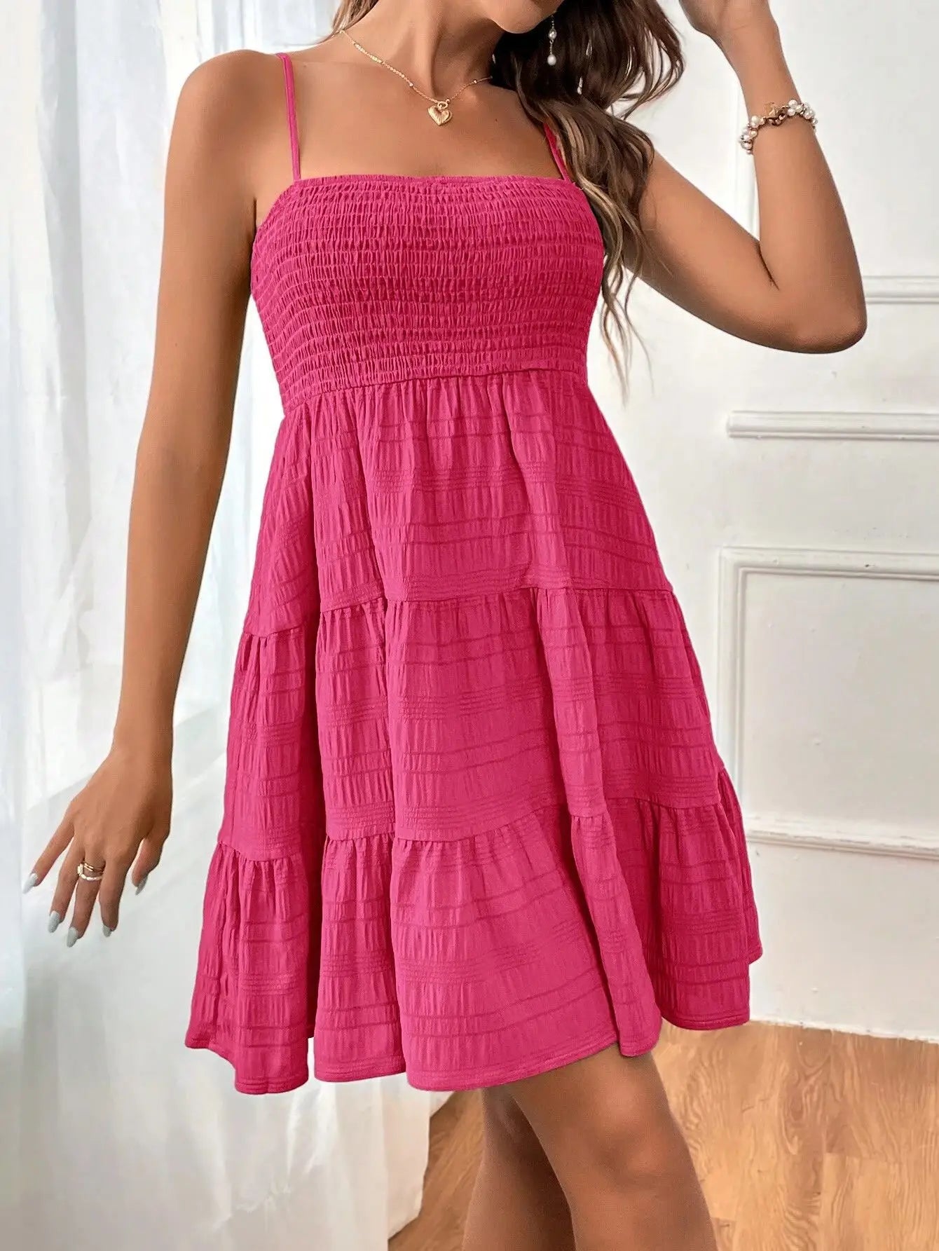 Ruba Tiered A-Line Mini Dress
فستان رُبى الميني المتدرّج
