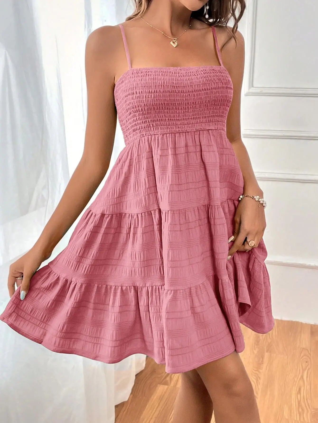 Ruba Tiered A-Line Mini Dress
فستان رُبى الميني المتدرّج