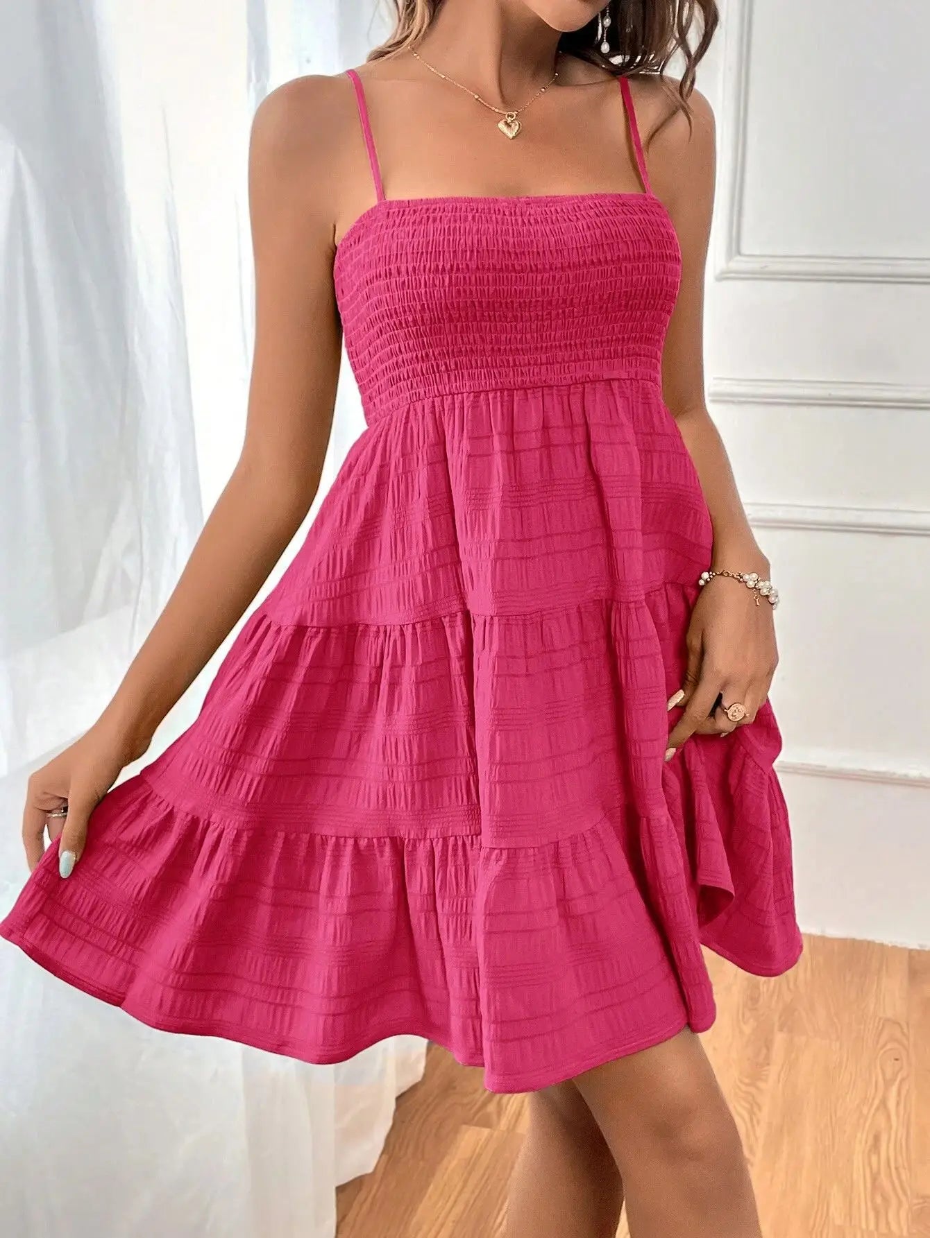 Ruba Tiered A-Line Mini Dress
فستان رُبى الميني المتدرّج