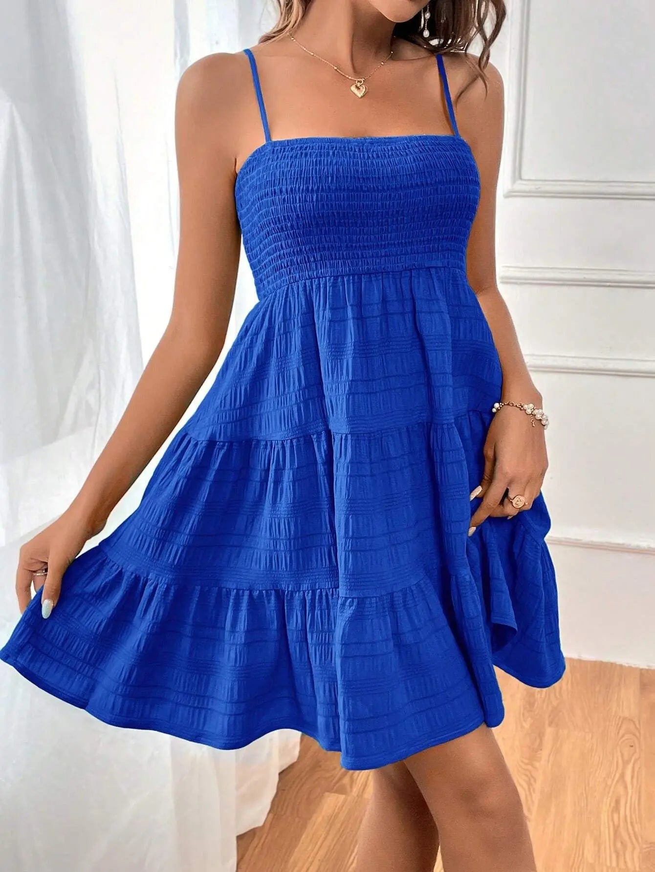 Ruba Tiered A-Line Mini Dress
فستان رُبى الميني المتدرّج